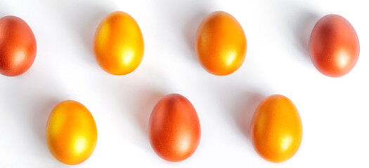 Pattern of golden eggs on white background. Happy Easter.