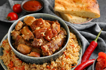 Tasty Asian pilaf on table