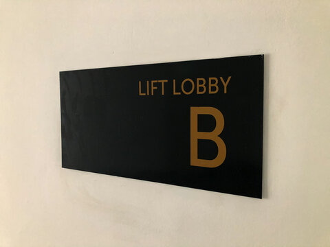 Lift Lobby Sign Area On The White Wall