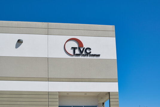 TVC office building exterior facade in Houston, TX. Tiger Valve Company main entrance in vertical format.