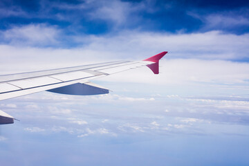 Fototapeta premium Cloudy view sky airplane, view from airplane window