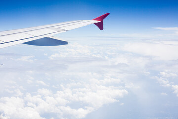 Fototapeta na wymiar Cloudy view sky airplane, view from airplane window
