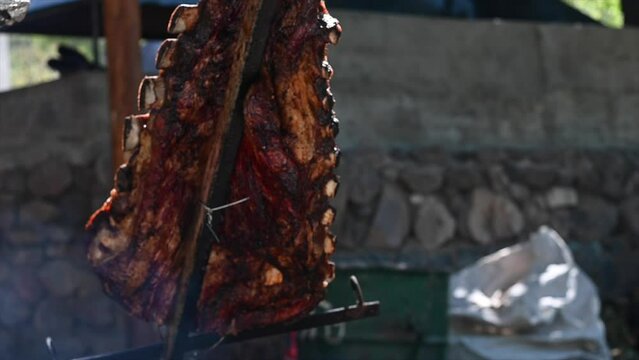 close-up grilled meat roast argentinian stake in slow motion 2
