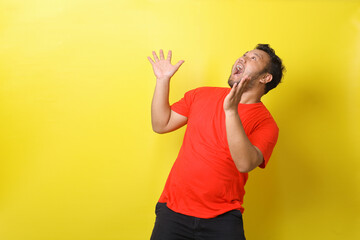 Fat Man over isolated yellow background with surprise facial expression