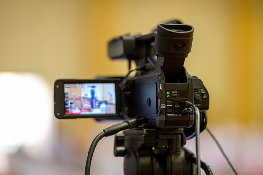 Video camera operator Professional camera filming a video podcast