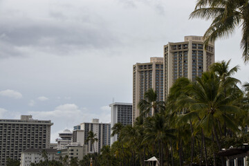 Fototapeta na wymiar Turquoise waves wash ashore on Waikiki Beach in Honolulu, Hawaii