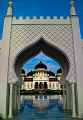 Naklejka premium Baiturrahman Mosque, Aceh, Indonesia. Baiturahman Mosque is a historic mosque and witnessed the awesomeness of the 2014 Aceh tsunami 