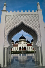 Naklejka premium Baiturrahman Mosque, Aceh, Indonesia. Baiturahman Mosque is a historic mosque and witnessed the awesomeness of the 2014 Aceh tsunami 