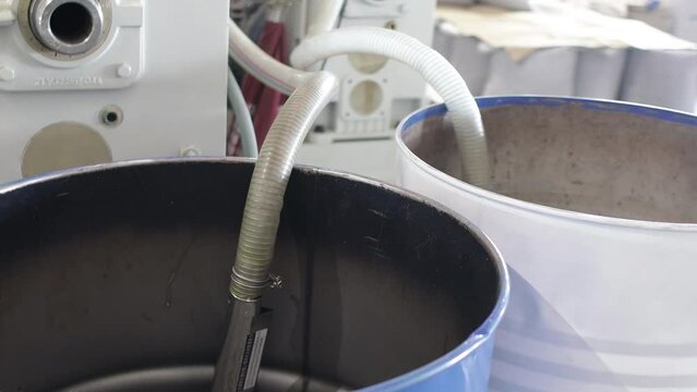 Barrel with polypropylene granules in the technological process. PP Pet Chips Semi Dull, PET chips recycle, PET polyester chips