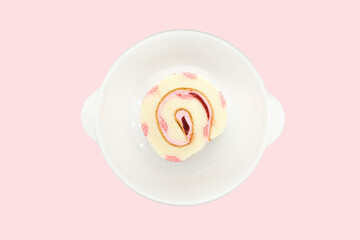 strawberry roll cake isolate on pink background