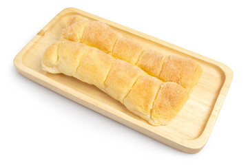 Rows of Soft Buttered Bread topping with sugar served on wooden tray isolated on white background. Clipping path.	
