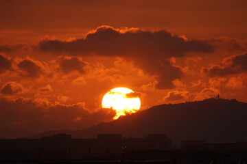 Beautiful Bright Sun rising setting the sky on fire
