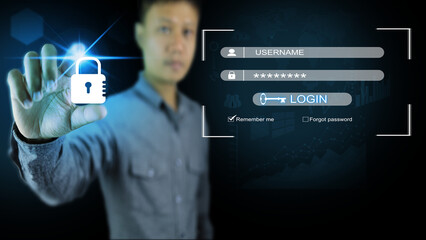 A man's hand presses a lock to prevent cyber data information from being lost or stolen from...
