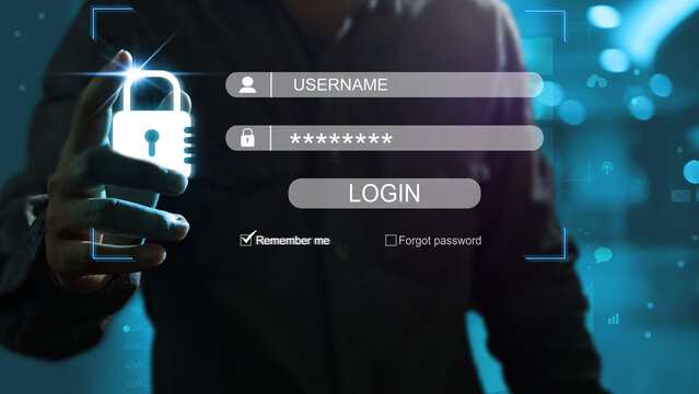 Man's hand presses the padlock and takes the body to protect information from lost or stolen from hackers or competitors by username and password to login. Cyber  IT security ISO IEC 27001 and 27002.