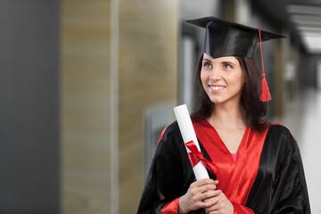 Woman graduate student with diploma
