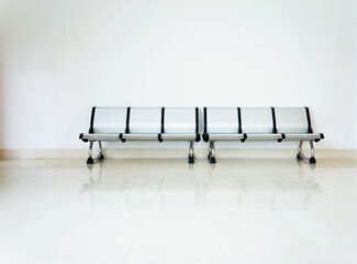 Row of empty chairs in the waiting room