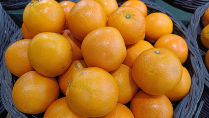 Fresh orange fruits in the basket