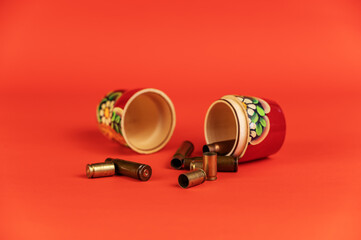 Matryoshka and sleeves against a kora background. Tradition Russian symbol and empty pistol and...