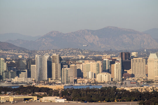 Looking Over The Skyline Of Downtown San Diego, Naval Air Station North Island  And The Peninsular Ranges In The Distance From Point Loma