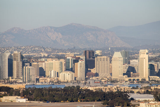 Looking Over The Skyline Of Downtown San Diego, Naval Air Station North Island  And The Peninsular Ranges In The Distance From Point Loma