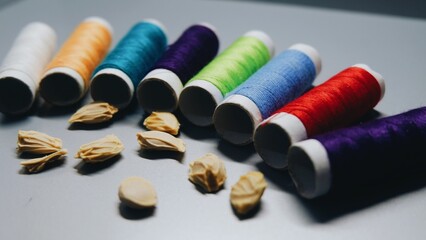 Grapefruit seeds and sewing thread combination