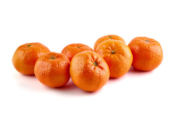 Tangerine or clementine, close-up, isolated on a white background.
