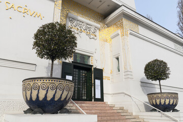 Facade of the famous Secession Building with golden dome in Vienna, Austria. January 2022