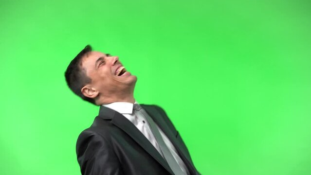 Rebellious and undisciplined employee in a suit laughing nonstop