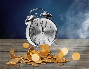 money background, coins and alarm clock on the table, concept of bank deposits,