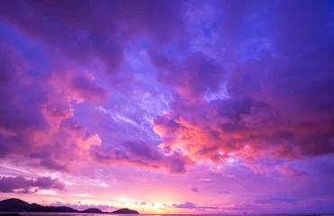  Cyberpunk color trend popular background. Nature beautiful Light Sunset or sunrise colorful Dramatic majestic scenery Sky with Amazing clouds in sunset sky purple light cloud background © panya99