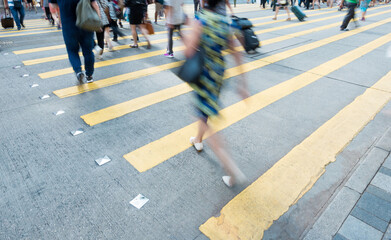 Crowd of people walking on busy hong kong street
