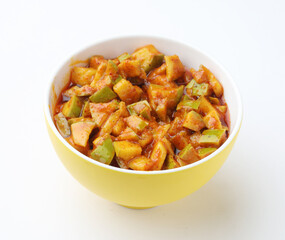 Homemade Mango Pickle or aam ka achar or Kairi Loncha in a  bowl