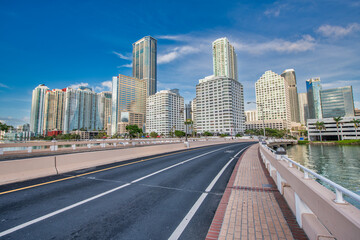 Downtown Miami morning skyline as seen from Brickell Key Bridge.