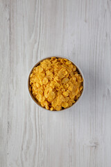 Tasty Corn Flakes in a Bowl, top view. Flat lay, overhead, from above.