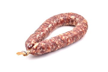 Dry cured pork sausage ring isolated on white