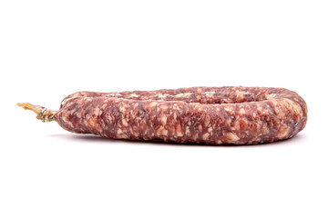 Dry cured pork sausage ring isolated on white