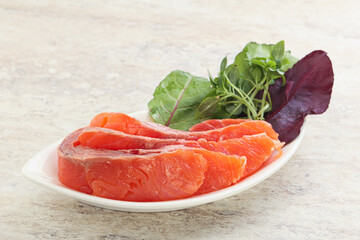Sliced salmon fillet starter snack