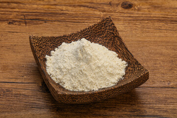 Wheat flour heap in the bowl