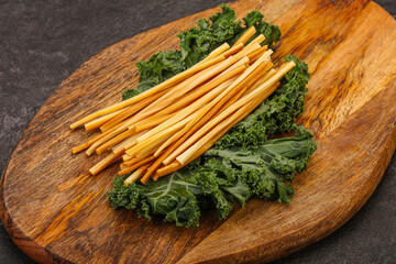 Chechel cheese sticks over board