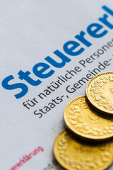 six golden coins on Swiss tax declaration form, Canton of Zurich