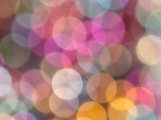 Multicolored festive bokeh as background.