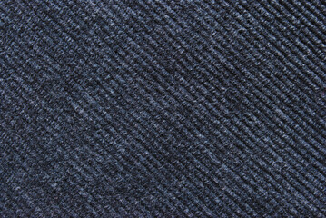 Dark blue corduroy fabric texture as background