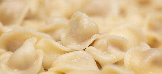 Boiled dumplings made from dough and meat.