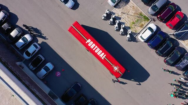 Aerial view of the Portugal team bus, arriving at the Jamor sports complex in Lisbon - screwdriver, drone shot