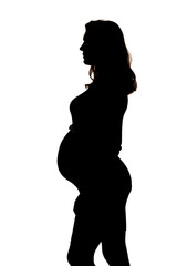 Silhouette of a pregnant woman posing in studio on a white background