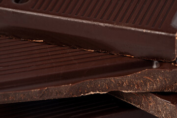 Milk chocolate bars stack for background, close up