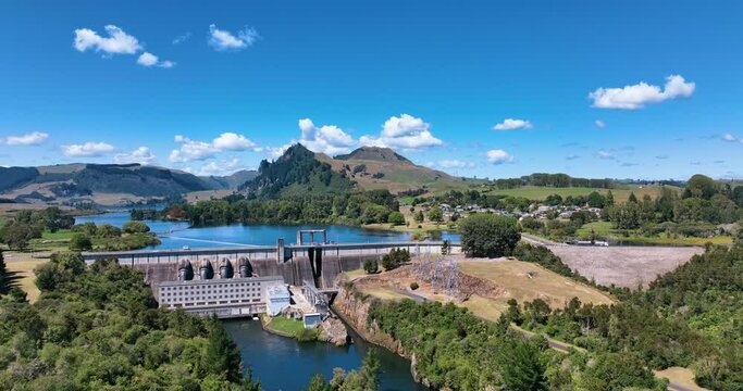 Flight towards Whakamaru dam and lake on picturesque Summers day - Aotearoa