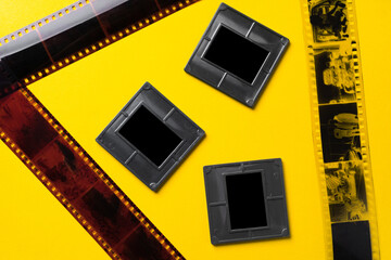 Photography empty slide frames on yellow background