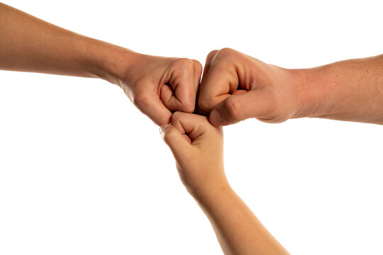 Family hands in different generation Giving Fist Bump. Successful business teamwork with hands gesture communication. Family partnership family work together harmony, trust concept