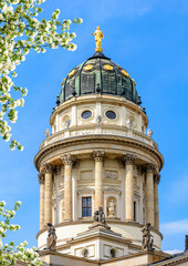 Fototapeta na wymiar French Church (Französischer Dom) dome on Gendarmenmarkt square in spring, Berlin, Germany